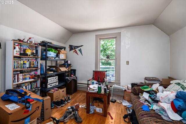 490 W 4th Ave, Eugene, OR 97401 - office area featuring vaulted ceiling, wood finished floors, and a baseboard heating unit