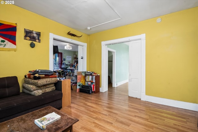 490 W 4th Ave, Eugene, OR 97401 - living room featuring light wood-style floors and baseboards