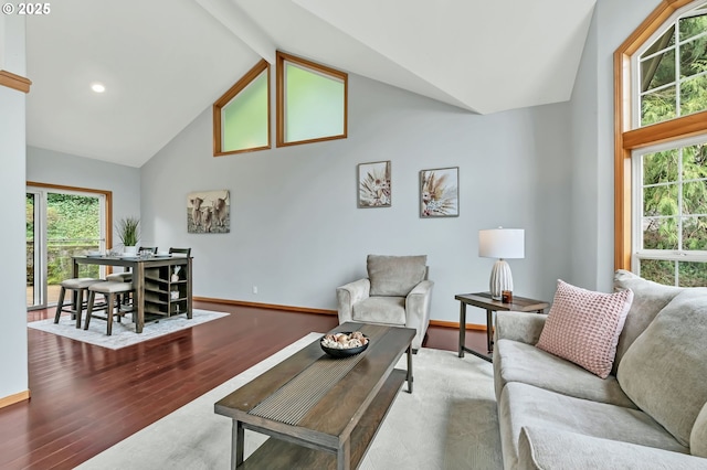 3870 Ashford Dr, Eugene, OR 97405 - living room featuring healthy amount of natural light, wood finished floors, baseboards, high vaulted ceiling, and recessed lighting