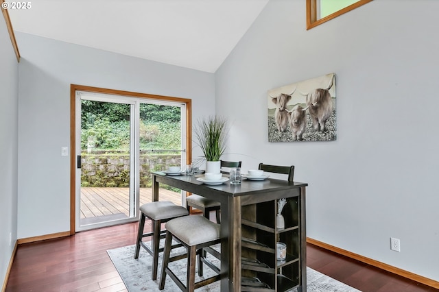 3870 Ashford Dr, Eugene, OR 97405 - dining area with vaulted ceiling, baseboards, and wood finished floors