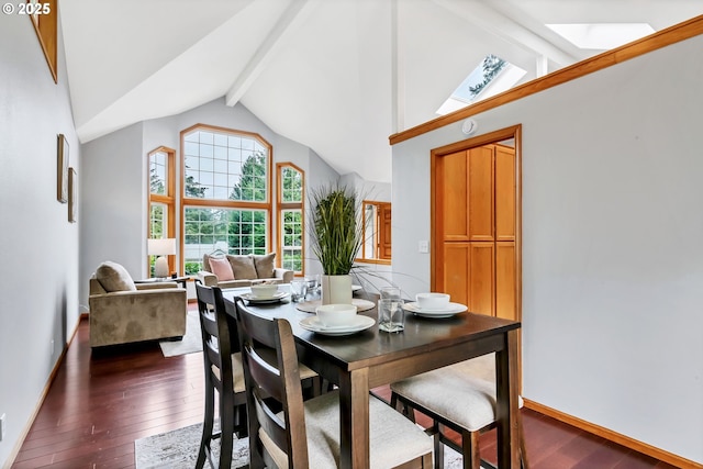 3870 Ashford Dr, Eugene, OR 97405 - dining room featuring beam ceiling, a skylight, dark wood-style floors, baseboards, and high vaulted ceiling