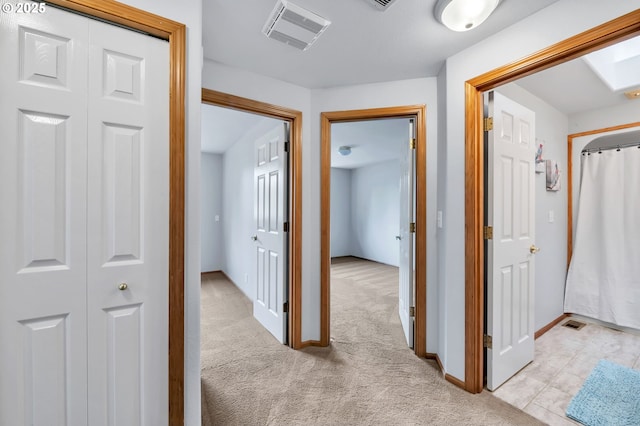 3870 Ashford Dr, Eugene, OR 97405 - corridor with light colored carpet and baseboards