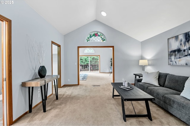 3870 Ashford Dr, Eugene, OR 97405 - living room featuring light carpet, lofted ceiling, and baseboards