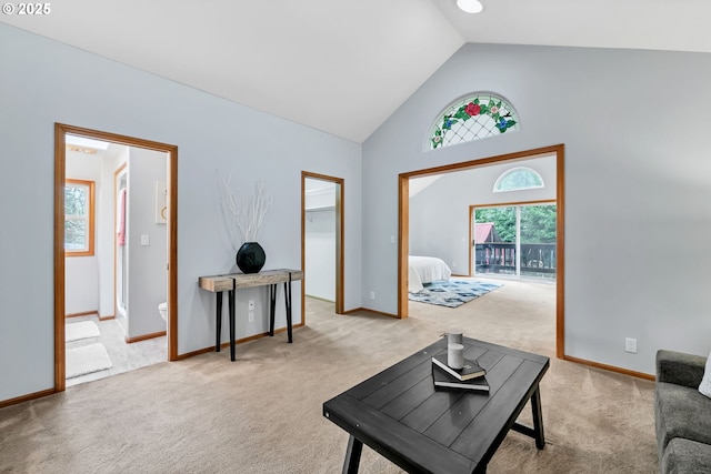 3870 Ashford Dr, Eugene, OR 97405 - carpeted living area with high vaulted ceiling and baseboards