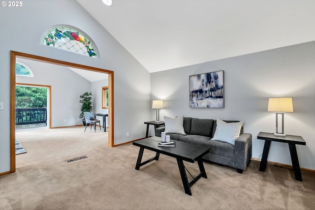 3870 Ashford Dr, Eugene, OR 97405 - living room featuring carpet flooring, baseboards, and high vaulted ceiling