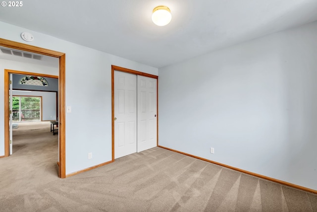 3870 Ashford Dr, Eugene, OR 97405 - unfurnished bedroom featuring carpet flooring, baseboards, and a closet