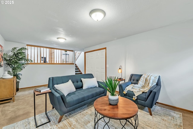 3870 Ashford Dr, Eugene, OR 97405 - living room with light carpet, stairway, baseboards, and a textured ceiling