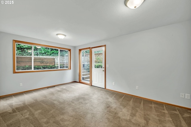 3870 Ashford Dr, Eugene, OR 97405 - carpeted empty room featuring baseboards