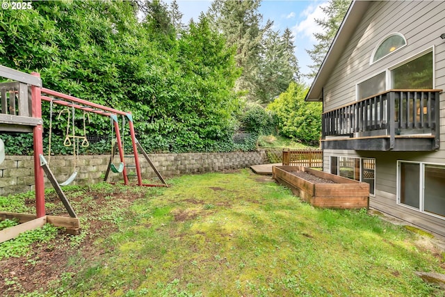 3870 Ashford Dr, Eugene, OR 97405 - view of grassy yard featuring a vegetable garden and a playground