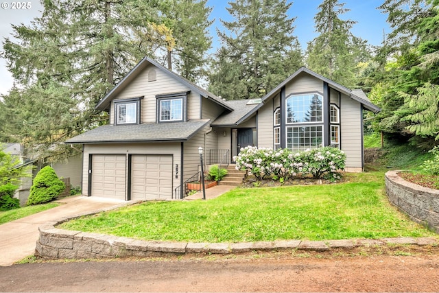 3870 Ashford Dr, Eugene, OR 97405 - tri-level home featuring a garage, driveway, a front lawn, and roof with shingles
