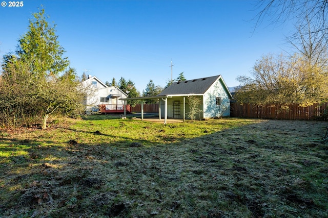 view of yard featuring a wooden deck