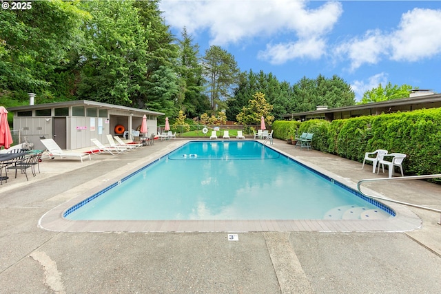 4460 SW Scholls Ferry Rd Unit 5, Portland, OR 97225 - community pool with a patio area and view of scattered trees