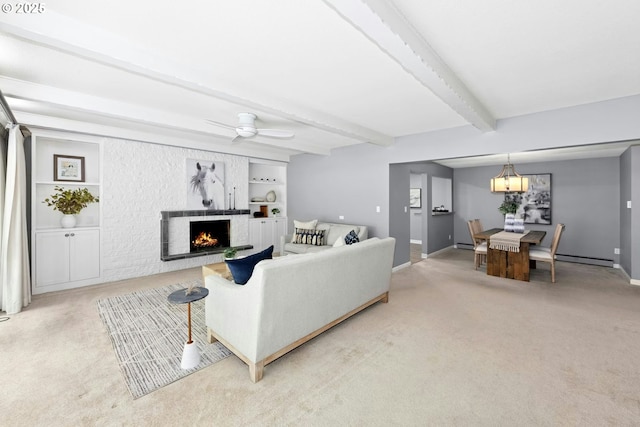 4460 SW Scholls Ferry Rd Unit 5, Portland, OR 97225 - living area with carpet flooring, beamed ceiling, baseboard heating, a fireplace, and a baseboard radiator