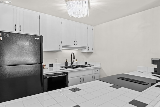 2547 Brittania Pl, Eugene, OR 97405 - kitchen featuring black appliances, tile countertops, white cabinetry, and a chandelier