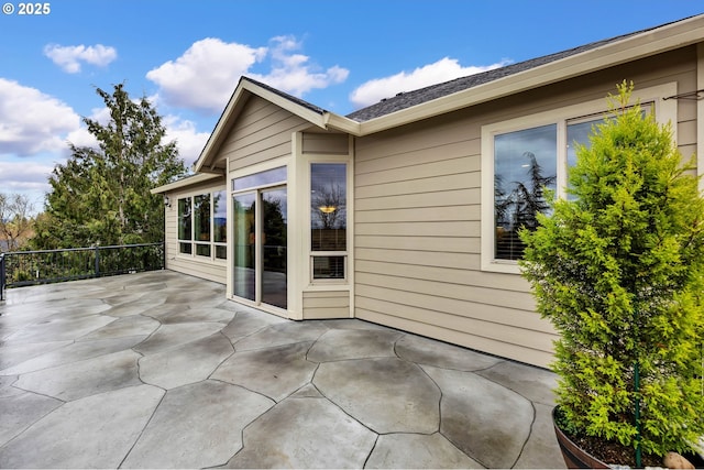 view of home's exterior with a patio