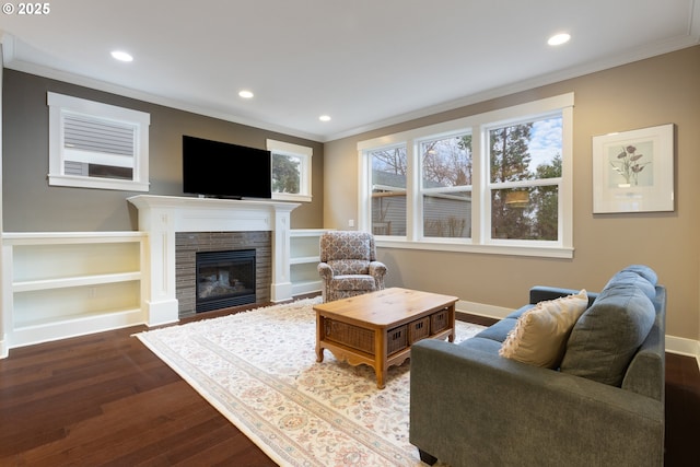 living room featuring crown molding and wood-type flooring