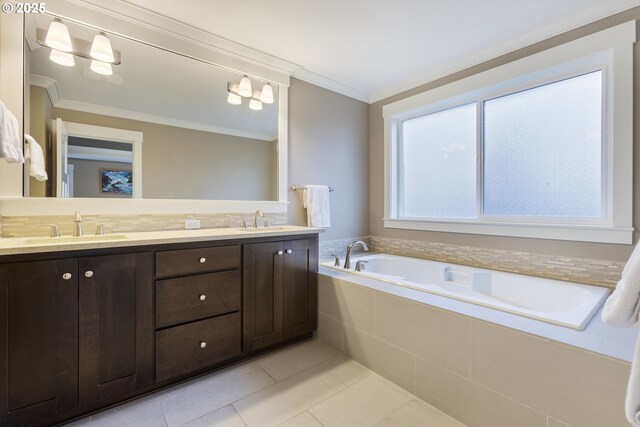 bathroom featuring vanity, crown molding, tiled bath, and tile patterned flooring