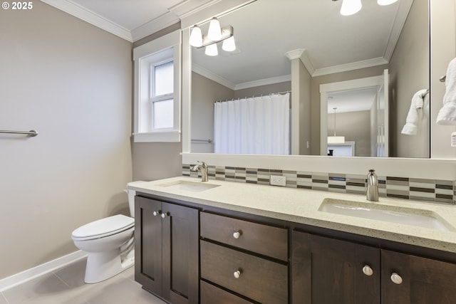 bathroom featuring vanity, toilet, tile patterned floors, and crown molding