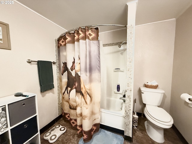 full bathroom with baseboards, toilet, and shower / tub combo with curtain