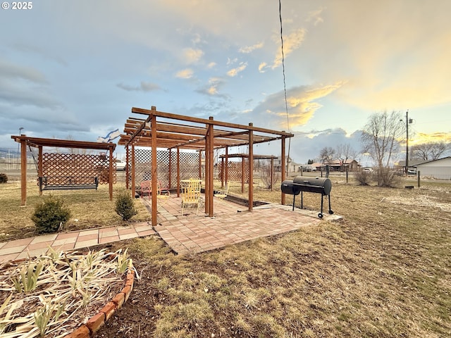 view of home's community with a pergola and a patio