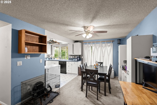 2653 SW 18th Pl, Gresham, OR 97080 - dining room featuring ceiling fan, a textured ceiling, and light carpet