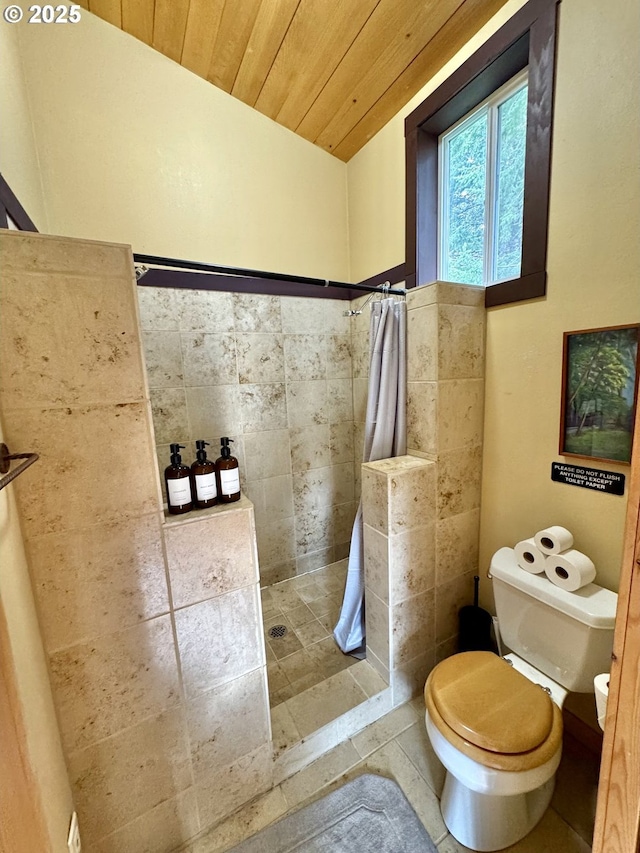 bathroom featuring wood ceiling, toilet, and a shower with shower curtain