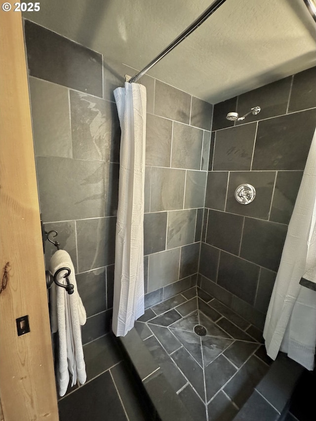 bathroom featuring walk in shower