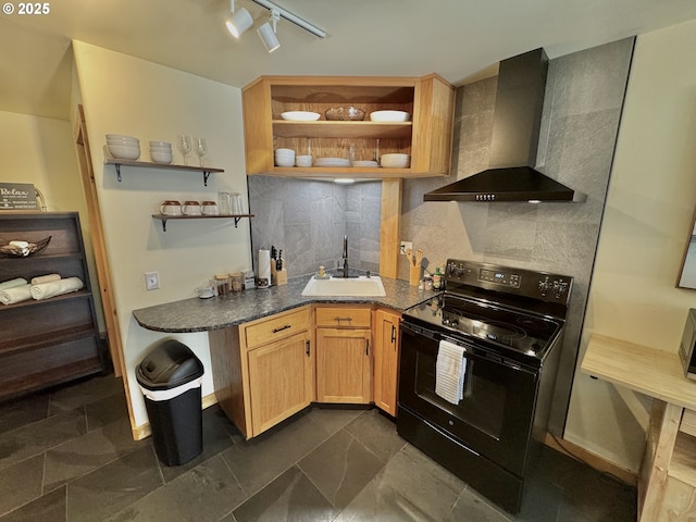 kitchen with sink, tasteful backsplash, light brown cabinets, black range with electric cooktop, and wall chimney range hood