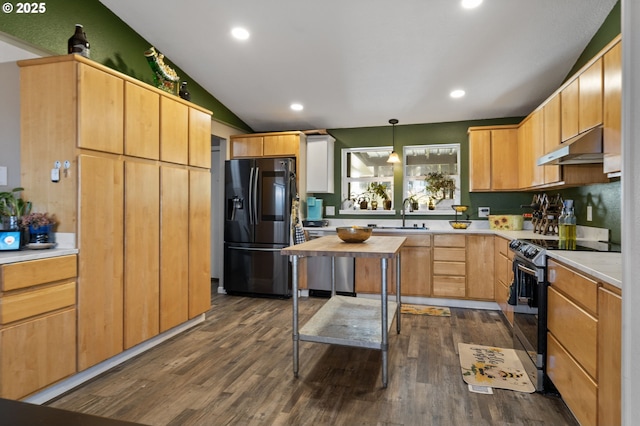 kitchen featuring pendant lighting, lofted ceiling, dark hardwood / wood-style floors, range with electric stovetop, and stainless steel fridge with ice dispenser