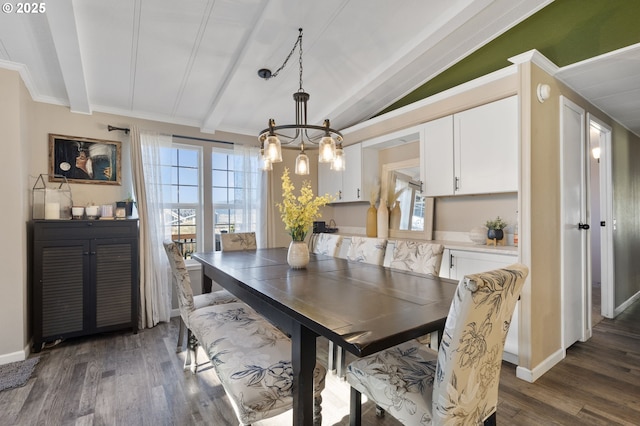 dining area with dark hardwood / wood-style flooring, vaulted ceiling with beams, and a notable chandelier