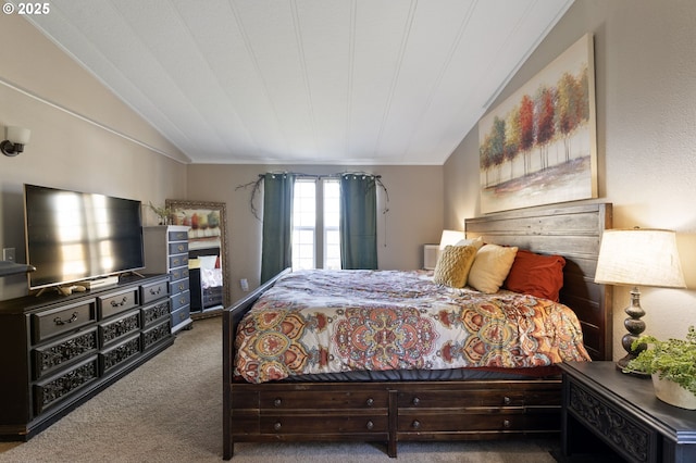 carpeted bedroom with vaulted ceiling