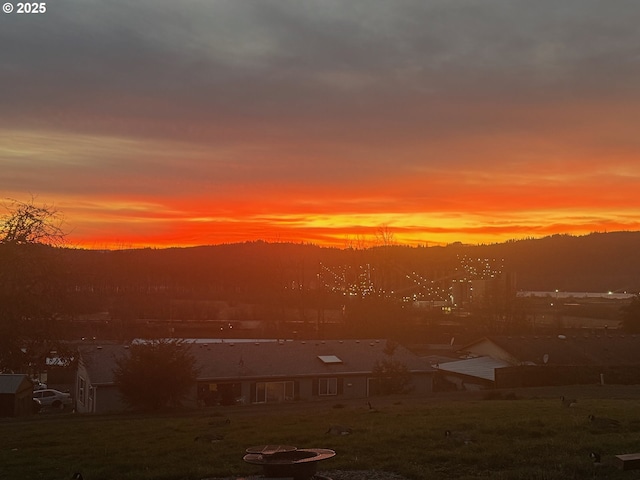 nature at dusk featuring a mountain view