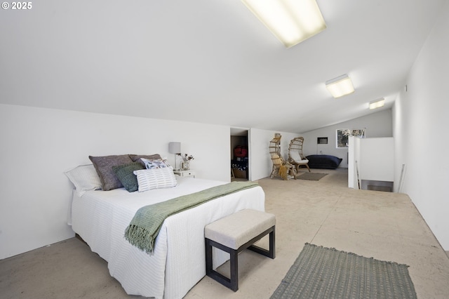 bedroom with lofted ceiling