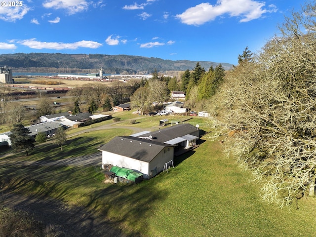 drone / aerial view featuring a mountain view