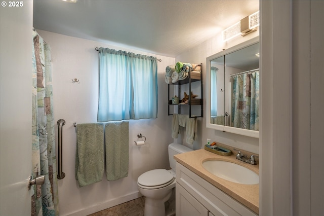 full bath featuring toilet and vanity