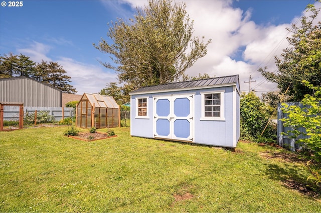 view of greenhouse with a shed