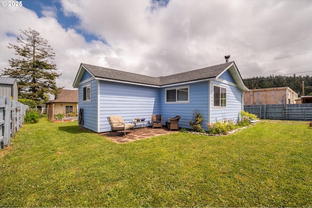 back of property with an outdoor hangout area, a patio, and a shingled roof
