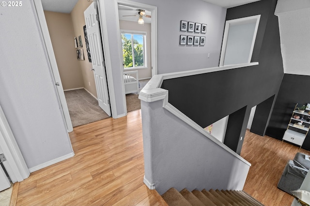 42015 NW Buckshire St, Banks, OR 97106 - staircase with baseboards, ceiling fan, and wood finished floors
