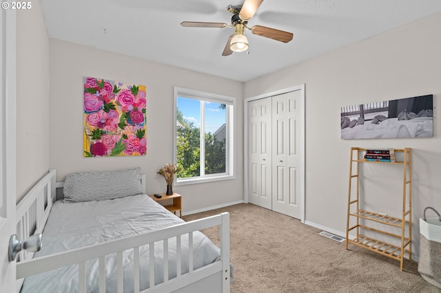 42015 NW Buckshire St, Banks, OR 97106 - bedroom with ceiling fan, carpet floors, baseboards, visible vents, and a closet