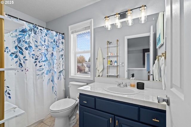 42015 NW Buckshire St, Banks, OR 97106 - bathroom with vanity, a textured ceiling, curtained shower, and toilet