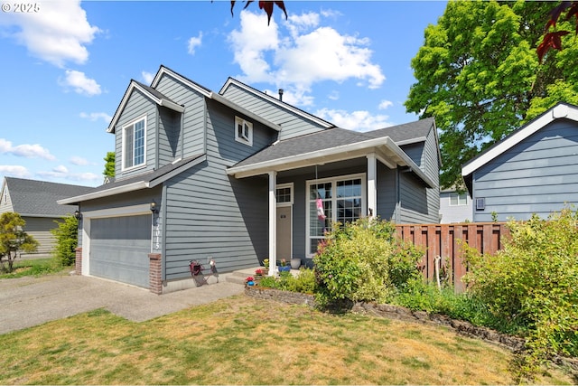 42015 NW Buckshire St, Banks, OR 97106 - view of front of home with fence, roof with shingles, a front lawn, a garage, and driveway