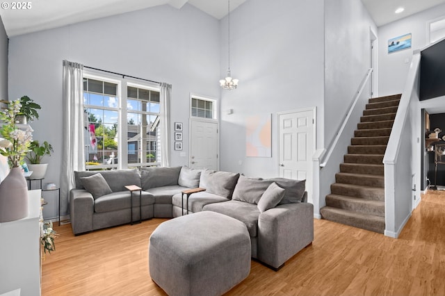 42015 NW Buckshire St, Banks, OR 97106 - living room featuring stairs, high vaulted ceiling, and light wood-style floors