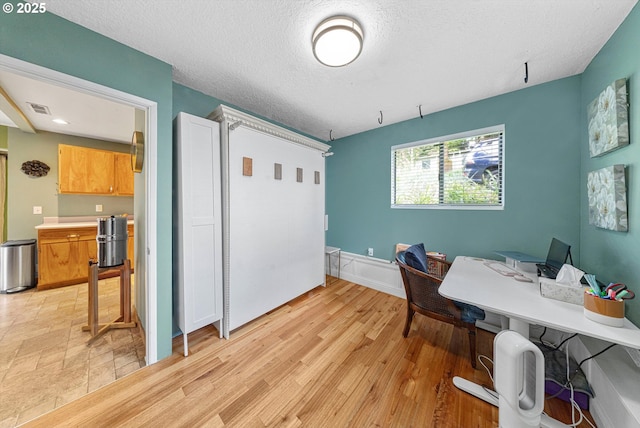 9333 SW 4th Ave, Portland, OR 97219 - office space featuring a textured ceiling and light wood-style flooring