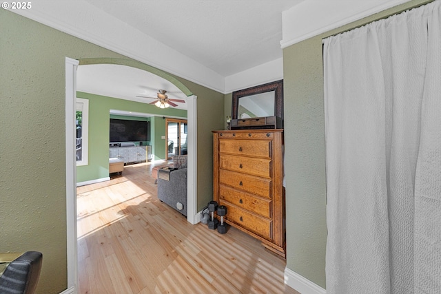 9333 SW 4th Ave, Portland, OR 97219 - hallway with wood finished floors, arched walkways, and baseboards