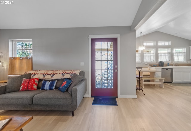 369 B St, Elkton, OR 97436 - living area with lofted ceiling, light wood-type flooring, and baseboards