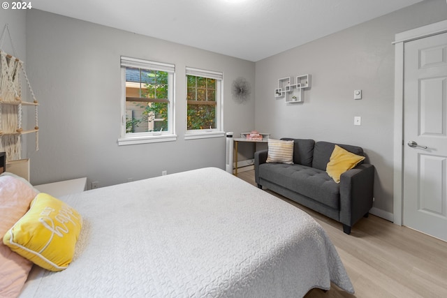 bedroom with light wood-style flooring