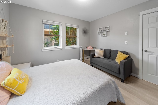 369 B St, Elkton, OR 97436 - bedroom featuring light wood-style flooring and baseboards