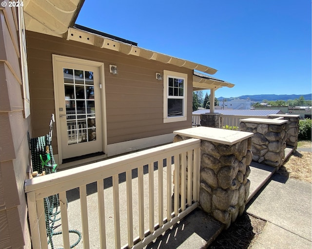 balcony featuring a mountain view