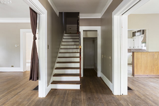3003 SE 58th Ave, Portland, OR 97206 - stairway featuring wood finished floors and ornamental molding