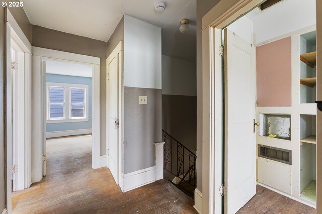 3003 SE 58th Ave, Portland, OR 97206 - hallway with hardwood / wood-style floors and an upstairs landing